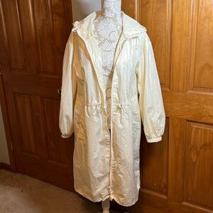 Cream knee length water resistant jacket